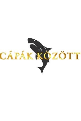 Cápák között